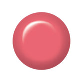 Swatch of IBD Just Gel Polish She’s Blushing, a flirty coral-pink crème with a glossy finish.